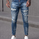 Мъжки дълги дънки в черен цвят с накъсан ефект "Slim Fit"
